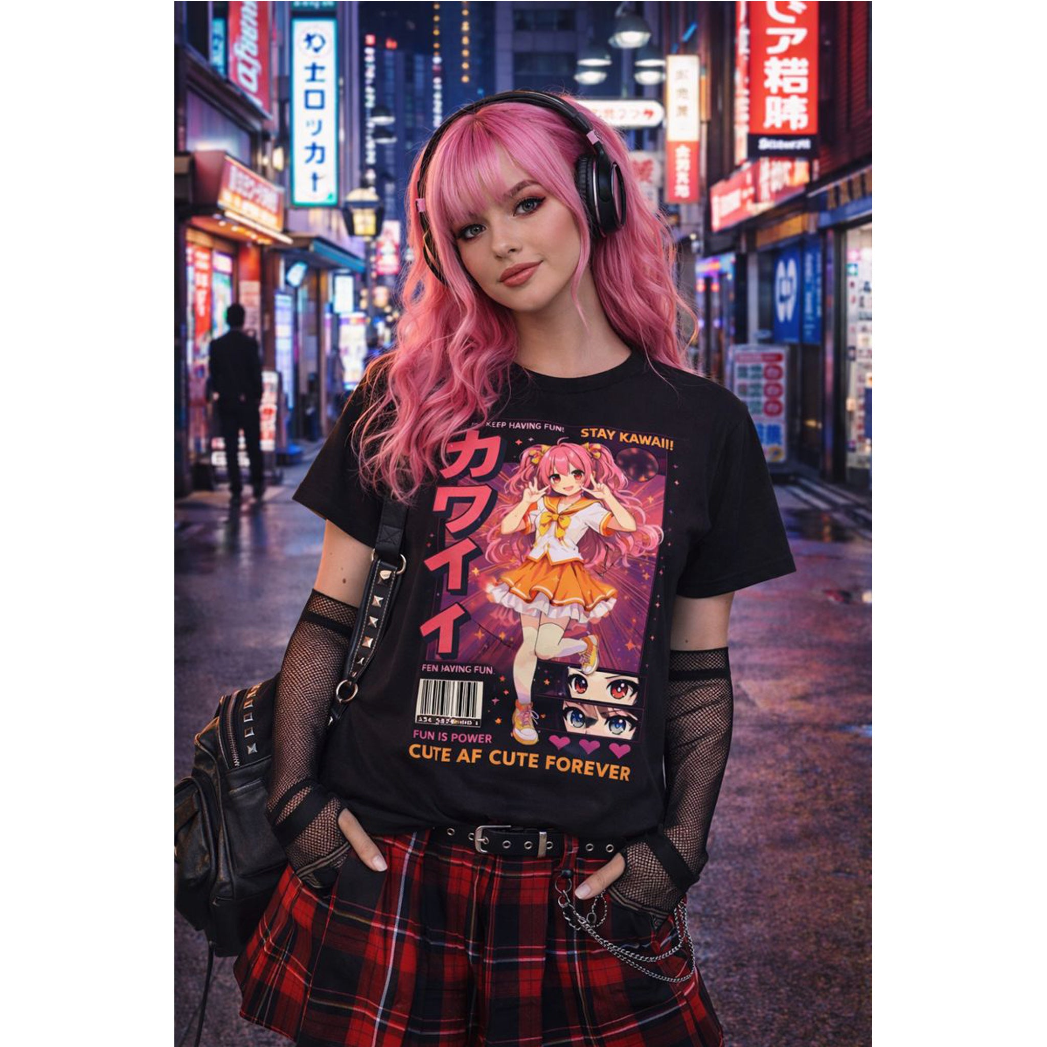 Person with pink hair wearing a black t-shirt with anime design in a neon-lit city street.